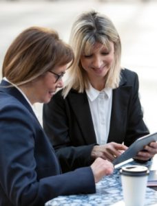 Client meeting with CPA in office, reviewing financial documents together_CPA consultation