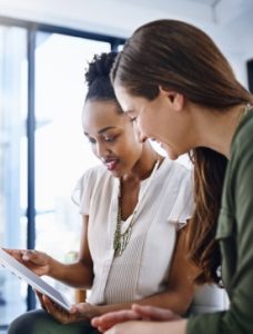 Client meeting with CPA in office, reviewing financial documents together_CPA consultation